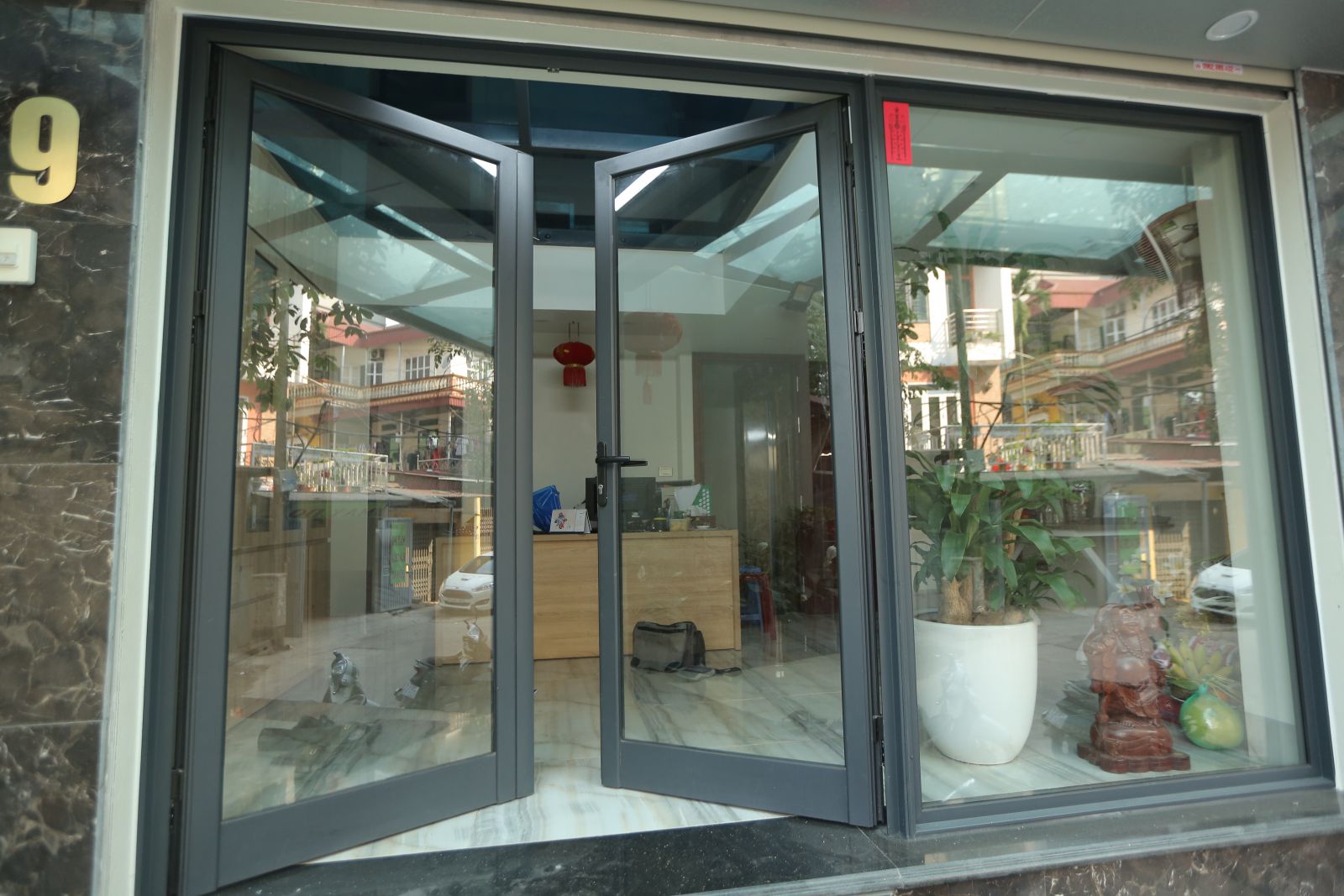 cua-di-mo-quay-2-canh