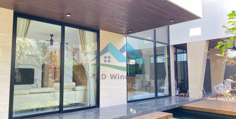 Mẫu cửa nhôm kính hợp phong thủy cho nhà hướng Đông Nam